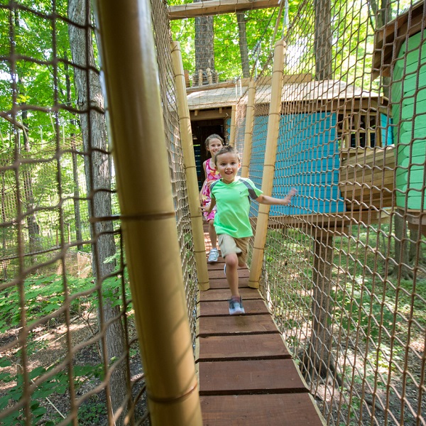 children explore treewalk village at bruces mill conservation park