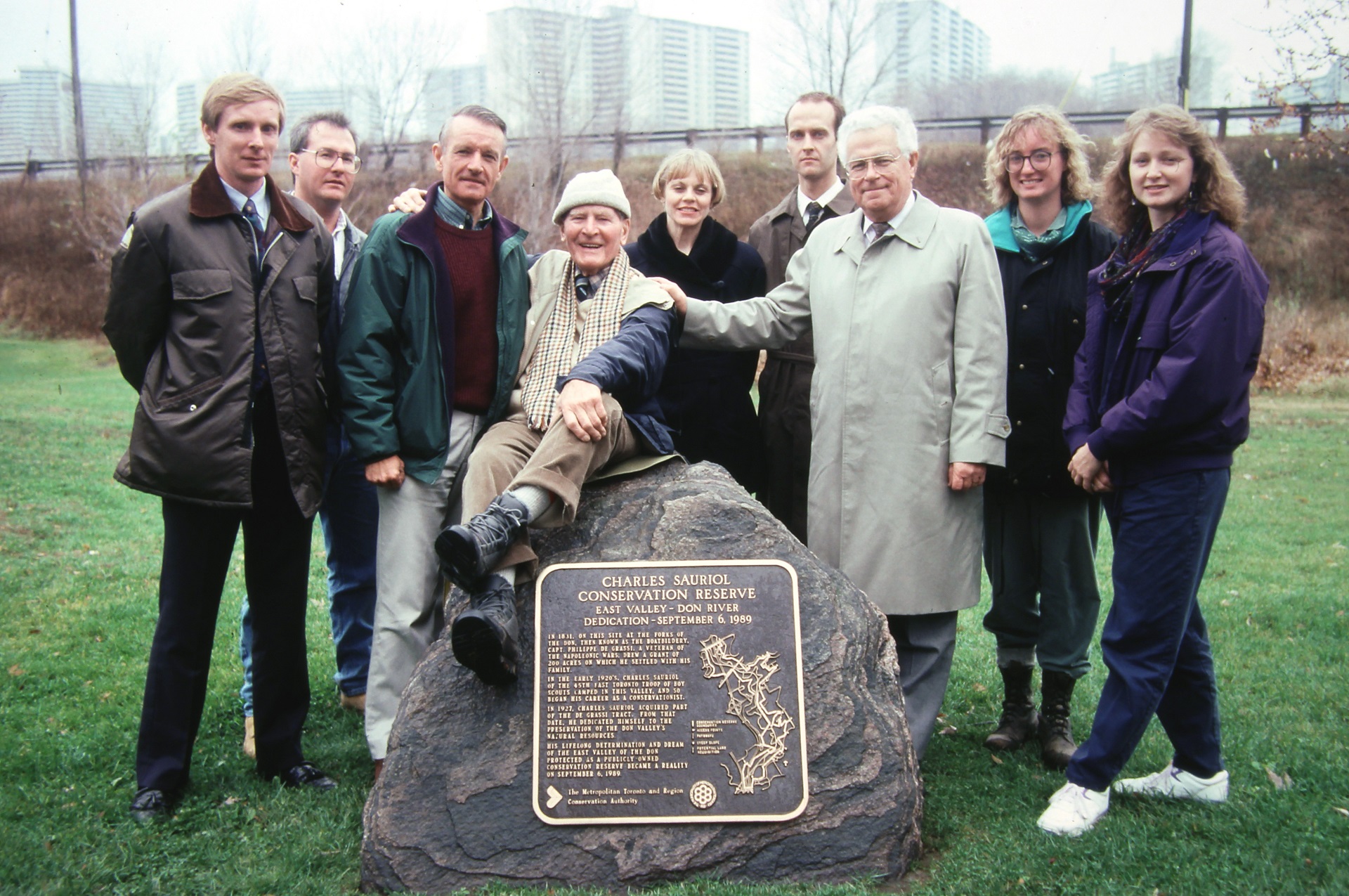Charles Sauriol poses with the plaque bearing his name at the Charles Sauriol Conservation Reserve in 1989