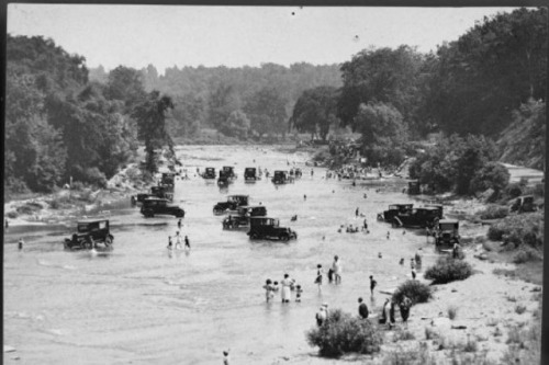 OId photo of people washing cars in the Humber River