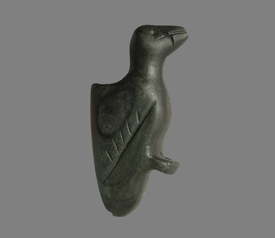 photograph of bird pipe archaeological artifact