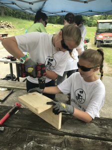 Young women wood working
