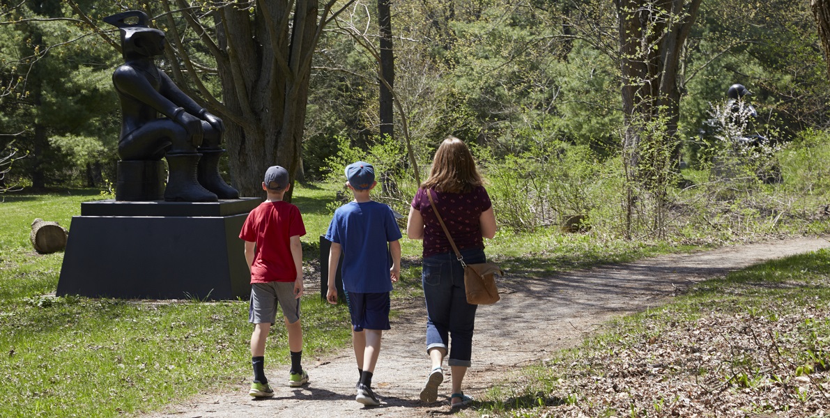 Family walking along a trail