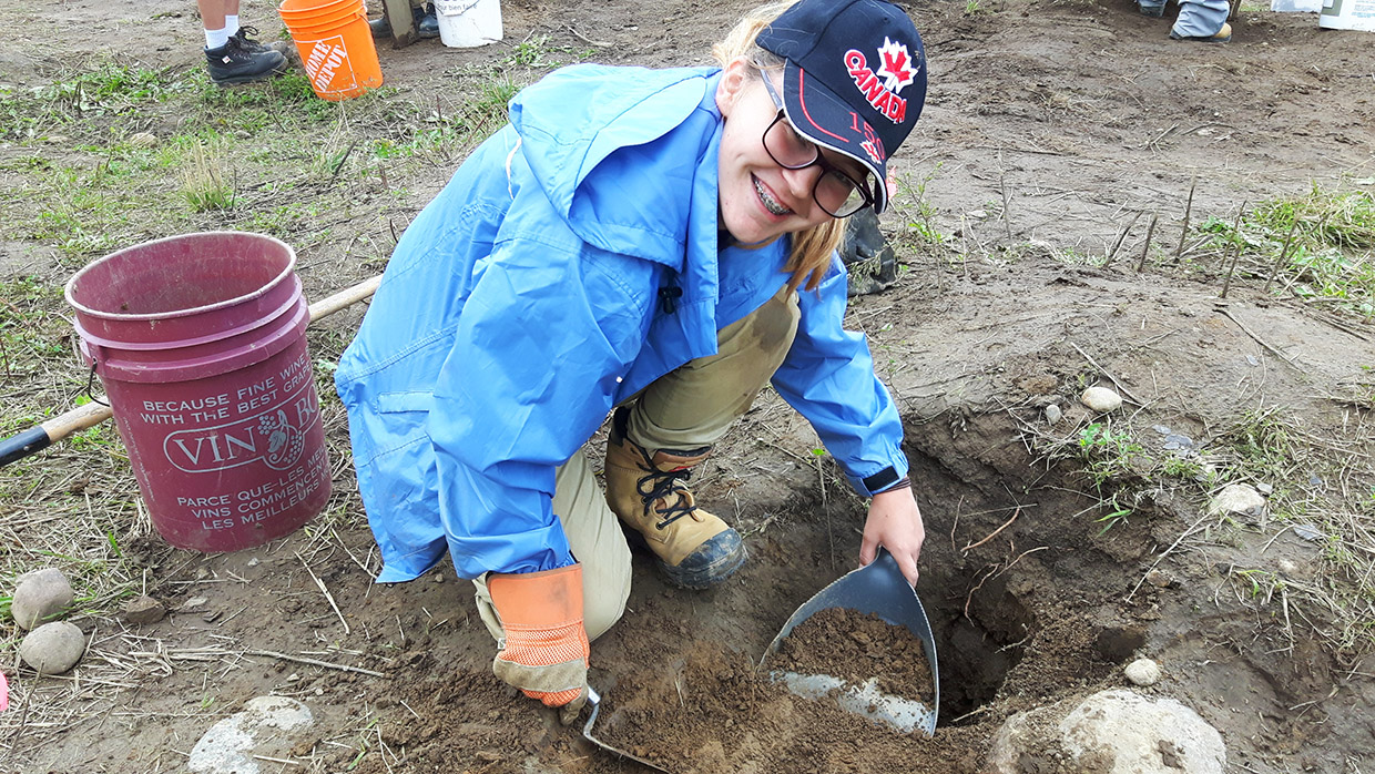 female student takes part in Boyd Field School archaeological dig