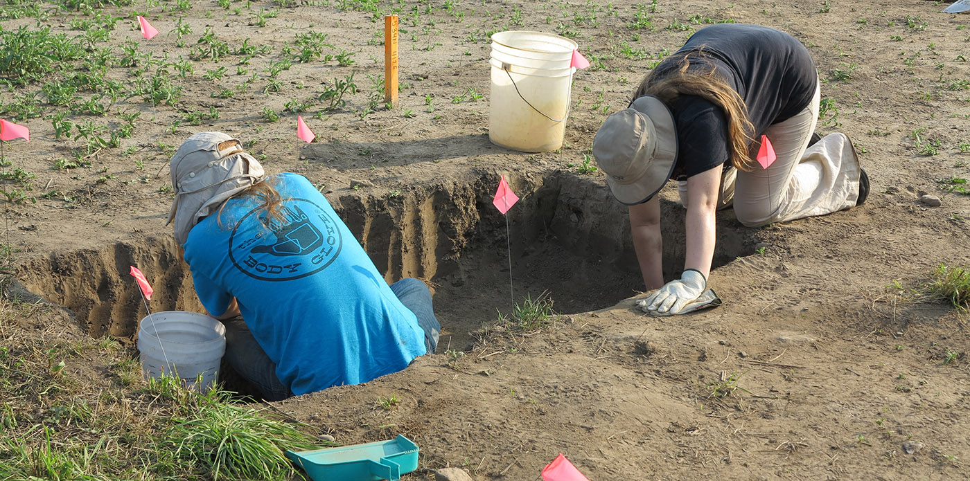 Boyd Archaeological Field School students work on excavation at dig site