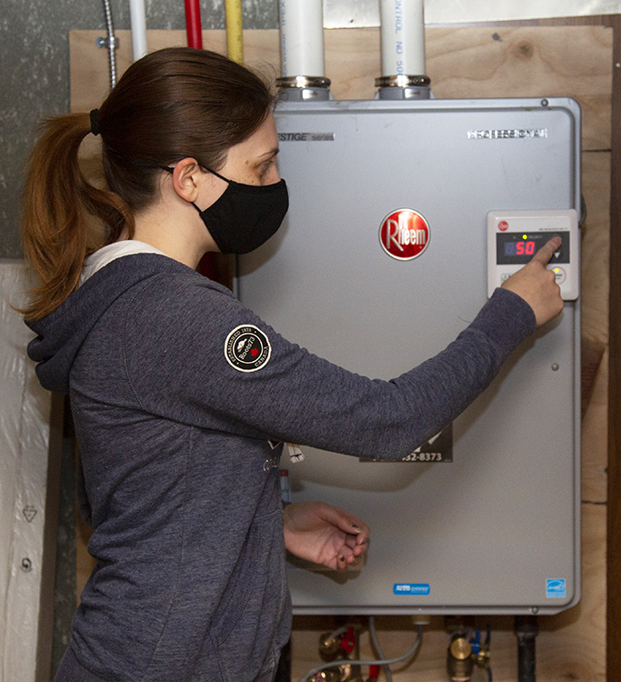 West Bolton SNAP Green Home Makeover Homeowners showcase their new energy efficient tankless water heater and furnace