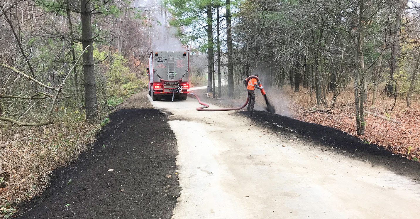 construction staff terraseeding a portion of the Eatst Don Trail